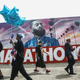 Fans walk as they wait outside The Marathon Clothing store for the funeral procession for slain rapper Nipsey Hussle on April 11, 2019 in Los Angeles, California.